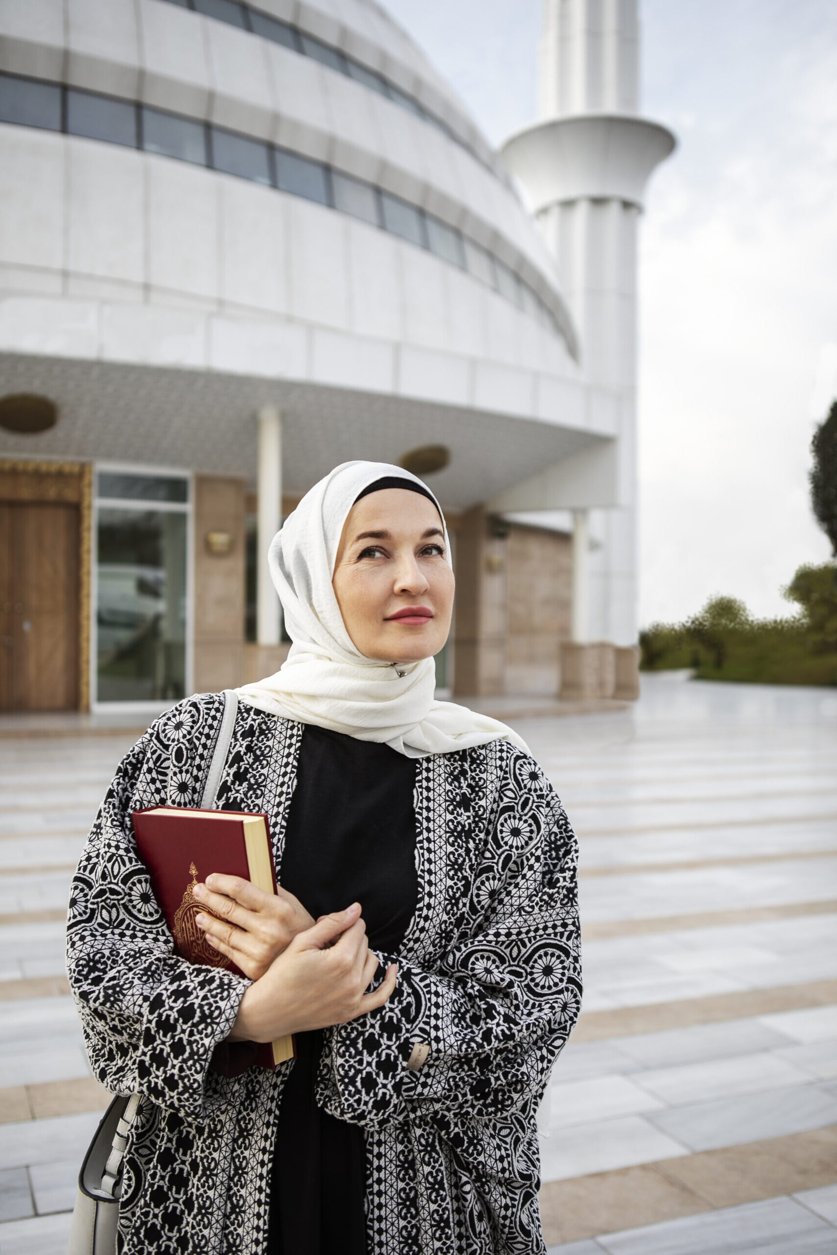 woman holding book front view scaled e1715077481809